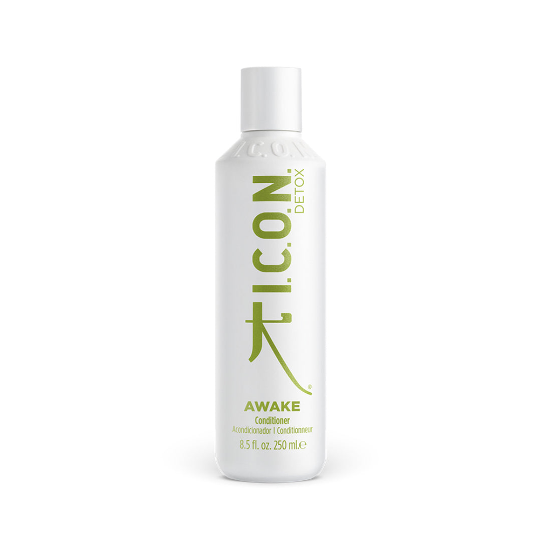 White bottle of Industry Beauty Supply I.C.O.N. Awake Detoxifying Conditioner, 250mL, with green and gold label text. This formula features organic oils for ultra-hydrated, nourished hair.