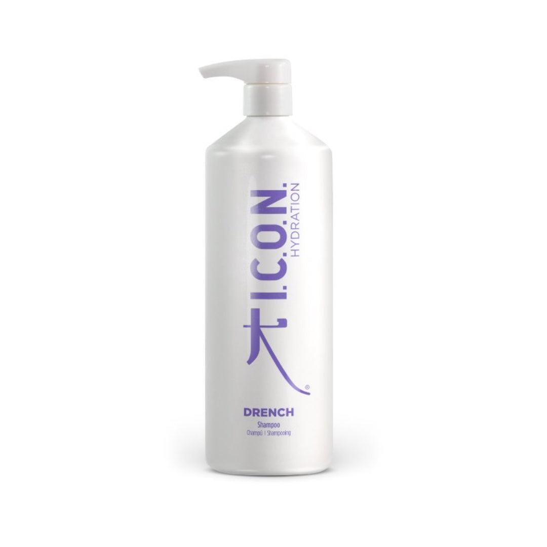 A white bottle of I.C.O.N. Drench Moisturizing Shampoo by Industry Beauty Supply, featuring a pump dispenser and purple text, hydrates the hair cuticle for better manageability and shine; available in 250mL or 1000mL sizes.