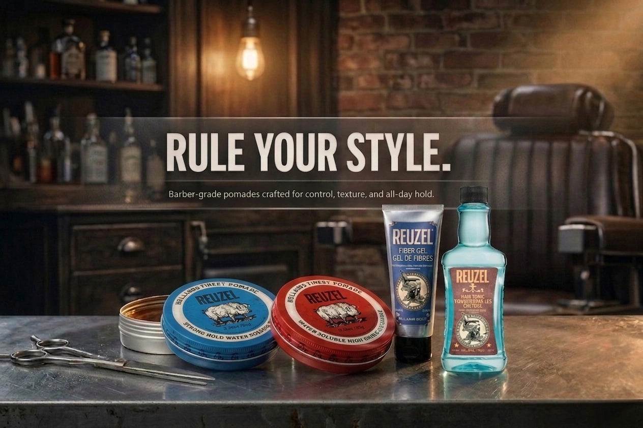 Barber products including pomades and a bottle on a counter with 'Rule Your Style' text.